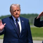 U.S. President Donald Trump waves as he departs Air Force One at Morristown Airport for a campaign and economic policy event at SUNY Rockland Community College on May 22, 2026 in Morristown, New Jersey.
