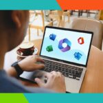 Laptop exibindo uma planilha com dados financeiros e gráficos, com uma xícara de café ao lado.
