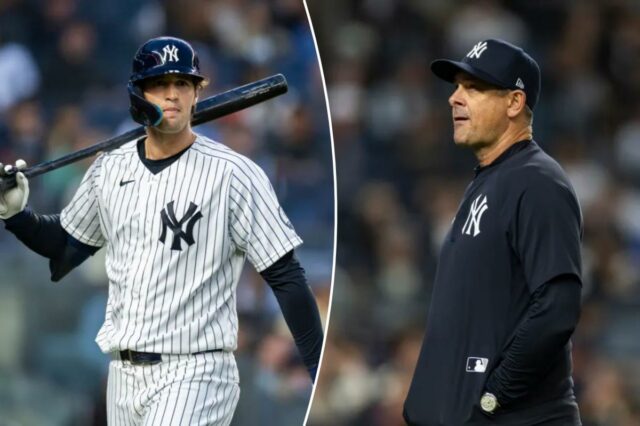 Enviar Spencer Jones de volta aos menores 'decisão realmente difícil' Spencer Jones, do New York Yankees, em campo com um taco por cima do ombro.
