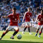 Equipe do Man Utd apoiando Shea Lacey antes do desafio de verão