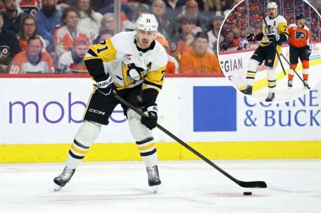 Evgeni Malkin assina novamente com os Penguins para retornar para Evgeni Malkin # 71 do Pittsburgh Penguins segura o disco contra o Philadelphia Flyers durante o primeiro período do sexto jogo da primeira rodada dos playoffs da Stanley Cup de 2026 na Xfinity Mobile Arena em 29 de abril de 2026 na Filadélfia, Pensilvânia.