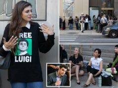 Fanáticos por Luigi Mangione fazem fila do lado de fora do tribunal antes da audiência importante no caso de assassinato Uma mulher usa um