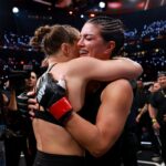 Ronda Rousey and Gina Carano hug after their MVP MMA main event fight on Netflix