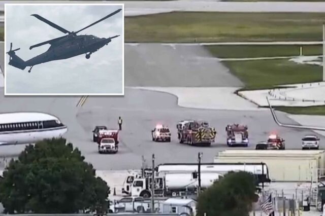 Guarda Costeira resgata 11 pessoas do oceano após queda de Um helicóptero cinza escuro voando contra um céu nublado.