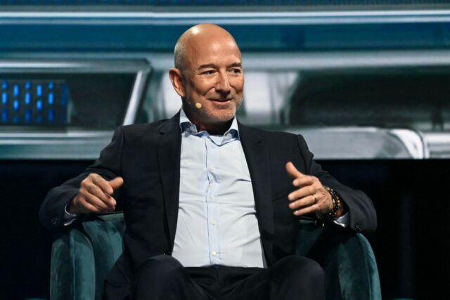 Amazon's founder Jeff Bezos speaks during the American Business Forum at the Kaseya Center in Miami on November 6, 2025.