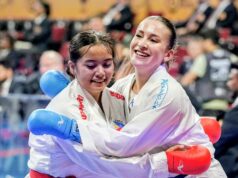 Karate One Youth League: pódio é difícil para apostas PH Ysabella Arwen Varias (à esquerda) e a romena Momanu Alexandra se abraçam após a partida da divisão feminina de -61 quilos pelo bronze da Karate One-Youth League no Mall of Asia Arena