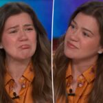 Kelly Clarkson chora ao discutir o fim do talk show em entrevista emocionante