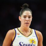 PORTLAND, OREGON - MAY 03: Kelsey Plum #10 of the Los Angeles Sparks looks on during the first half of a preseason game against the Portland Fire at Moda Center on May 03, 2026 in Portland, Oregon. (Photo by Soobum Im/Getty Images)