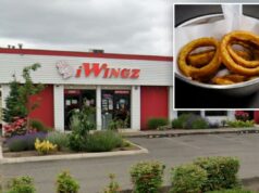 Mãe com alergia a cerveja sofreu choque anafilático com anéis de cebola em restaurante de Oregon: ação judicial Exterior do restaurante iWingz, um edifício vermelho e branco com uma pequena área ajardinada à sua frente.