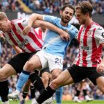 Man City x Brentford - Premier League AO VIVO: Jeremy Doku se aproxima novamente ao abrir o impasse para os anfitriões nervosos, que pretendem diminuir a distância para o líder da liga, Arsenal