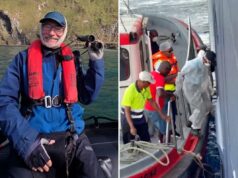 Médico de férias em cruzeiro contra hantavírus forçado a tratar pacientes depois que o médico do navio adoeceu Dr. Stephen Kornfeld, vestindo um colete salva-vidas e um boné, com bandagens em volta do rosto, segura binóculos enquanto está em um barco.