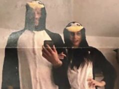 Meghan e Harry posam em trajes de pinguins em fotos inéditas Harry e Meghan em seus macacões de pinguim combinando.