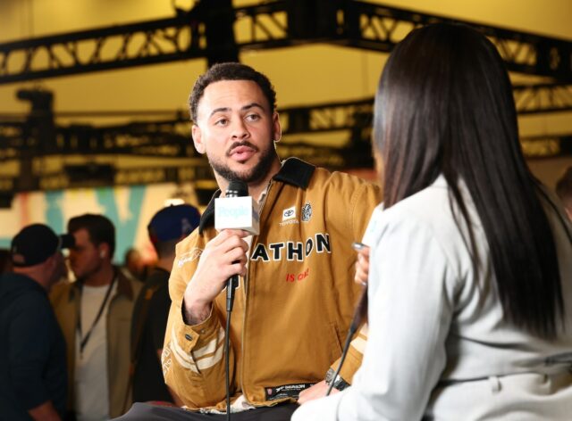 SAN FRANCISCO, CALIFORNIA - FEBRUARY 04: (L-R) Michael Pittman Jr. visits with Janine Rubenstein at SiriusXM on Radio Row at Super Bowl LX on February 04, 2026 in San Francisco, California. (Photo by Cindy Ord/Getty Images for SiriusXM)