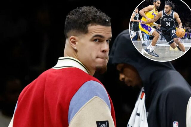 O jogador do Brooklyn Nets, Michael Porter Jr., no banco durante um jogo.