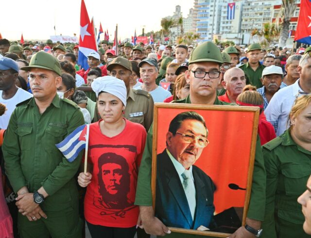 People attend a rally in support of former Cuban president Raul Castro, 94, who has been indicted by a US court, outside the US Embassy in Havana on May 22, 2026. (Photo by ADALBERTO ROQUE / AFP via Getty Images)
