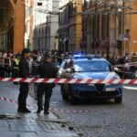 Financial Police patrol a scene after a car incident in a street of Modena, Italy, Saturday, May 16, 2026. (Lapresse via AP)