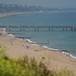 A polícia iniciou uma investigação depois que uma mulher teria sido estuprada na praia de Boscombe