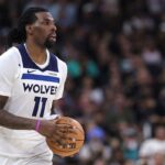 Anthony Edwards on bench at Minnesota Timberwolves playoff game