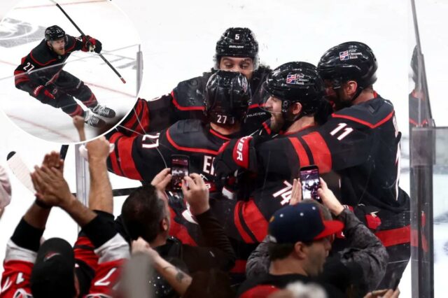 Nikolaj Ehlers faz o papel de herói enquanto os Hurricanes Nikolaj Ehlers (27) é assediado por companheiros de equipe depois de marcar o gol da vitória na prorrogação na vitória dos Hurricanes por 3 a 2 sobre os Canadiens no jogo 2 das finais da Conferência Leste em Raleigh, NC