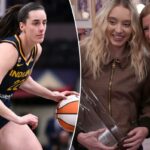 Caitlin Clark driblando a bola para o Indiana Fever.
