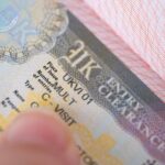 a close-up shot of a UK visa in someone's passport.