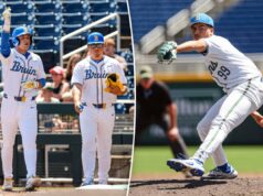 O beisebol da UCLA ganha o título do Big Ten Tournament de forma dramática Um arremessador de beisebol com uniforme branco com detalhes em azul e amarelo arremessa de um monte.