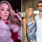 Lisa Hochstein e Jody Glidden posando juntas em um evento.