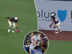 O início de pesadelo de Fernando Tatis Jr. continua enquanto o erro leva ao Grand Slam da Little League Um jogador de beisebol com uniforme branco e azul escuro e uma luva vermelha joga uma bola de beisebol em um campo verde durante um jogo com um placar mostrando Cardinals vs. Padres, 5ª entrada, placar de 0-0.