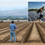 Um trabalhador da construção civil instala painéis solares num telhado.