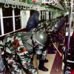 Members of the Japan Ground Self-Defense Forces clean up subway cars on March 20, 1995, in Tokyo after Aum Shinrikyo's sarin nerve gas attack.