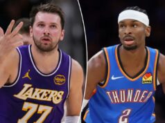 Os fãs do Lakers ficam furiosos com o número chocante de votos de MVP de Luka Doncic Luka Doncic com uma camisa roxa do Lakers gesticulando com três dedos.