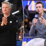 O técnico de basquete Steve Kerr bate palmas durante um jogo entre o Houston Rockets e o Golden State Warriors.