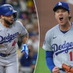 Shohei Ohtani em uniforme dos Dodgers cerrando o punho e gritando.