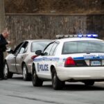 A Halifax police officer gives a motorist a ticket on Dunbrack Street on the side of the road on April 3, 2011, in Nova Scotia, Canada.