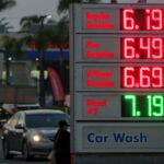 Gas prices over 6 dollars a gallon are seen on a sign at a Shell station on May 11, 2026, in San Diego
