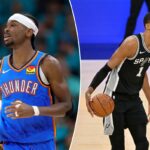 Shai Gilgeous-Alexander sendo ajudado por Jared McCain durante o terceiro jogo das finais da Conferência Oeste da NBA de 2026.