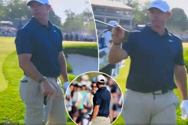 Rory McIlroy critica torcedor turbulento do PGA Championship: 'Cale a Rory McIlroy olha para o campo de golfe, com uma tabela de classificação mostrando-o em quinto lugar.