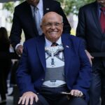 Rudy Giuliani no memorial do 11 de setembro em setembro