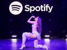 Spotify apresentará assinaturas como uma nova maneira de os criadores ganharem dinheiro Logotipo do Spotify contra o pôr do sol