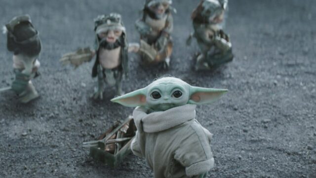 STAR WARS: THE MANDALORIAN AND GROGU, Grogu (front) with Anzellans, 2026. © Walt Disney Studios Motion Pictures / Courtesy Everett Collection