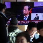 Tribunal sul-coreano reduz pena de prisão de Han Duck-soo em caso de lei marcial