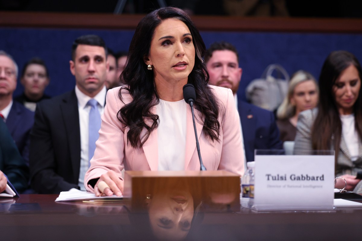 Director of National Intelligence Tulsi Gabbard stands after President Donald Trump spoke about the Iran war from the Cross Hall of the White House on April 1, 2026, in Washington.