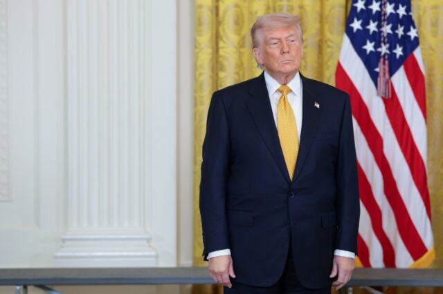 President Donald Trump stands by during a military mothers celebration in the East Room of the White House on May 6 in Washington, D.C. (Photo by Anna Moneymaker/Getty Images)