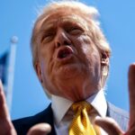 Donald Trump dirigiu-se aos meios de comunicação social no relvado sul da Casa Branca na terça-feira, antes do seu voo para se encontrar com o seu homólogo chinês Xi Jingping em Pequim.