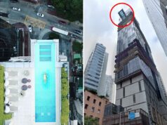 Turista americana mergulha na morte no 29º andar de hotel em Hong Kong O edifício do Hotel Indigo Hong Kong a partir de uma vista de rua de ângulo baixo, cercado por outros edifícios altos.