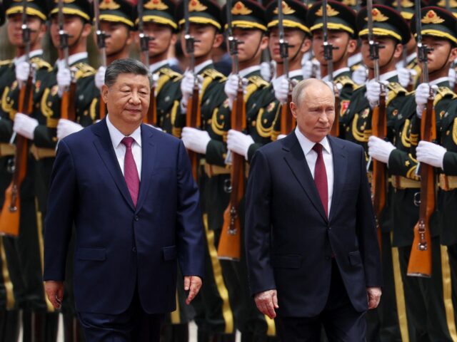 Xi Jinping, da China, e Vladimir Putin, presidente da Rússia, Xi Jinping, da China, e Vladimir Putin, presidente da Rússia, reúnem-se em Pequim