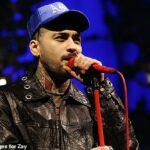 O retorno de Zayn Malik foi marcado por um novo drama na quinta-feira, quando a estrela teve garrafas de água atiradas nele enquanto ele deixava uma sessão de perguntas e respostas com fãs em Londres.