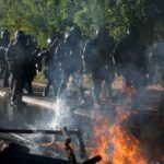 A violência irrompe durante protestos anti-G7 em Genebra, na véspera da cimeira