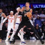Spurs player Victor Wembanyama against the New York Knicks' Jose Alvarado in the NBA Finals