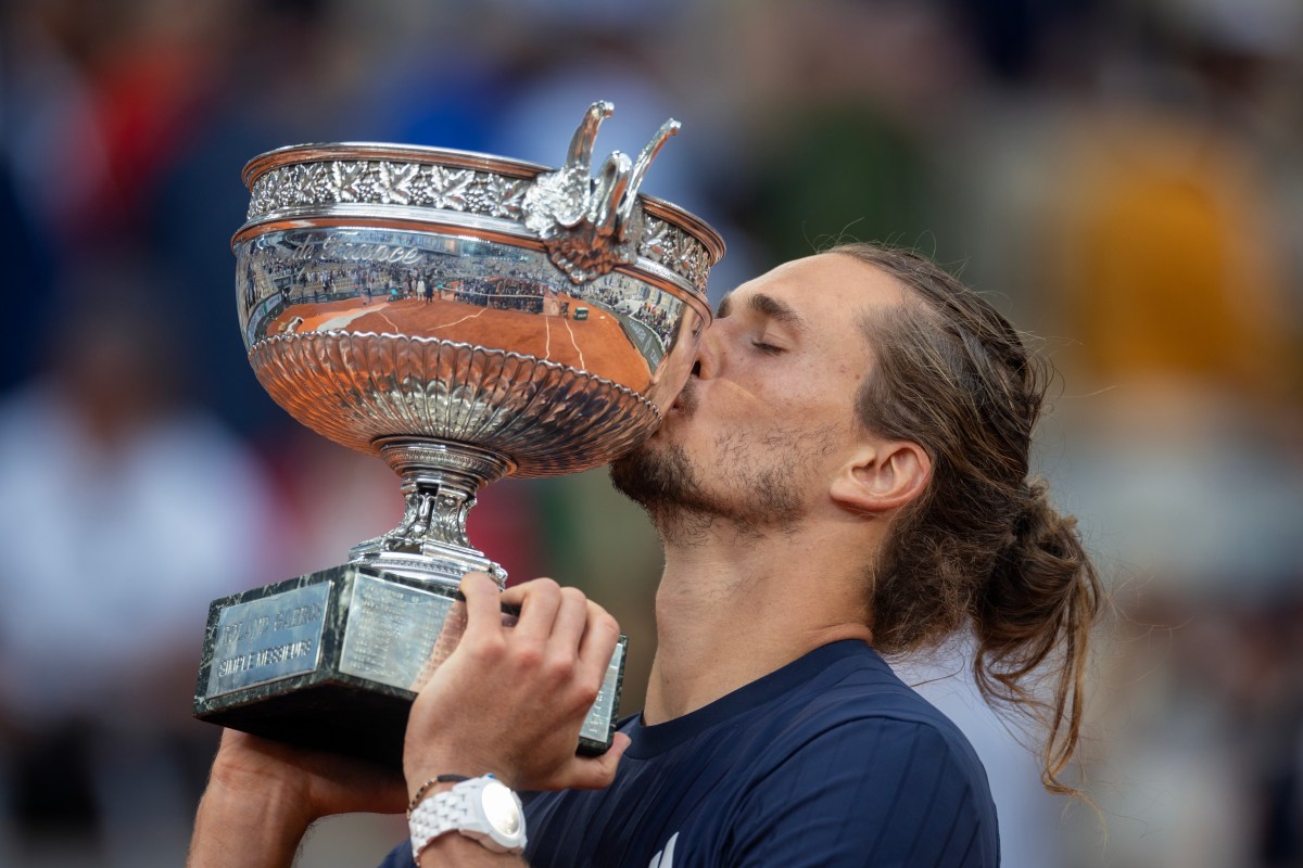PARIS, FRANCE - JUNE 07: Alexander Zverev of Germany with the winners' trophy after his victory against Flavio Cobolli of Italy in the Men's Singles Final on Court Philippe Chatrier at the 2026 French Open Tennis Tournament at Roland Garros on June 7th, 2026, in Paris, France. (Photo by Tim Clayton/Getty Images)